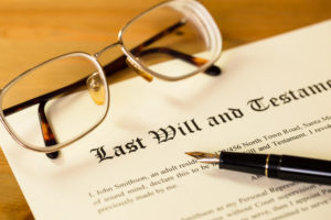 Last will and testament with pen and glasses - probate lawyer Lake St. Louis, MO