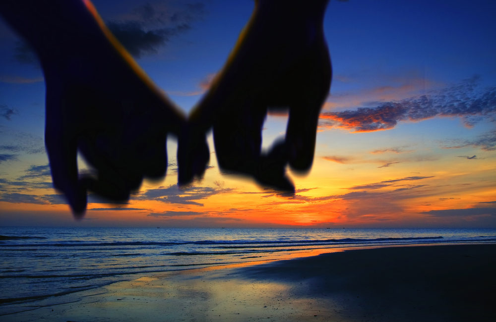 Naming Power of Attorney Authority - lover holding hand walking on the beach