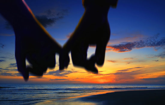 Naming Power of Attorney Authority - lover holding hand walking on the beach